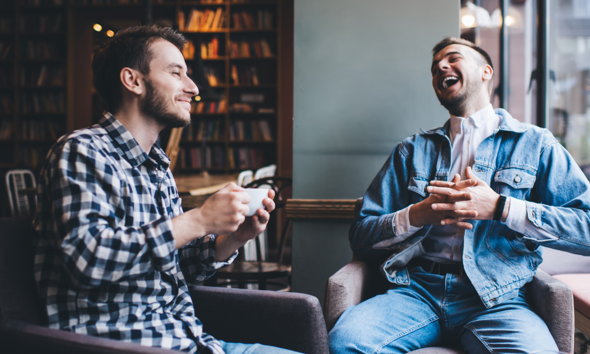 to men drinking coffee and talking